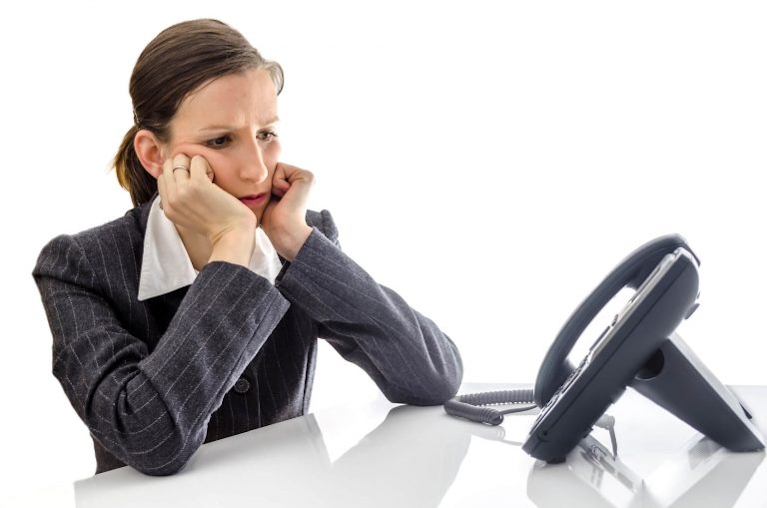 businesswoman having problems with on premise phone system