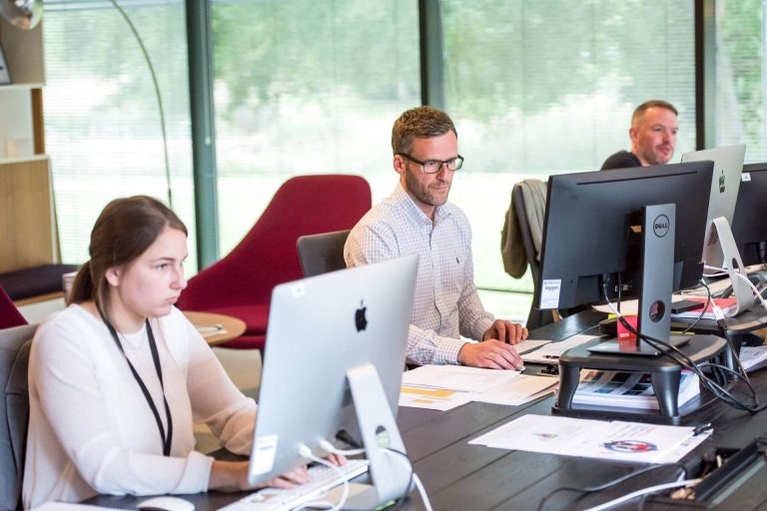 businesspeople researching what is a contact center