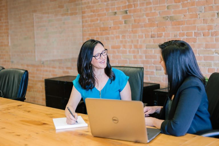 women talking about the importance of professionalism in customer service in the office